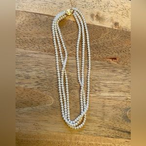 Three strand freshwater pearl necklace with 14k gold clasp